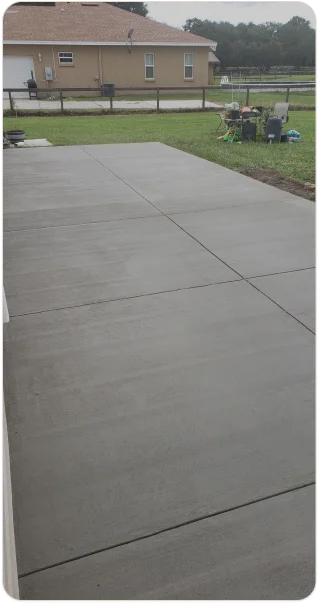 Freshly poured concrete patio behind a Kansas City home